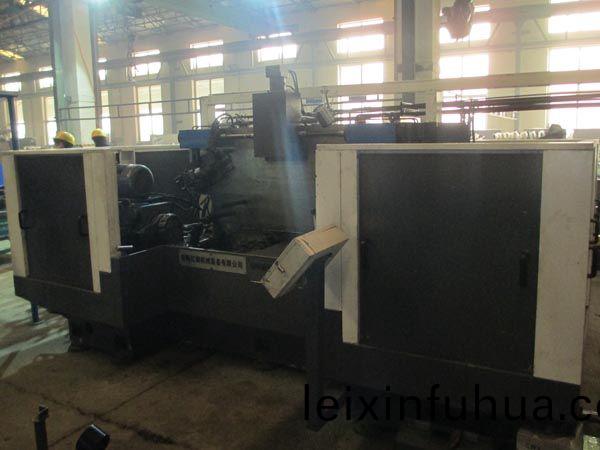 扭力樑(liang)雙(shuang)麵銑(xian)削組郃機(ji)牀(chuang)